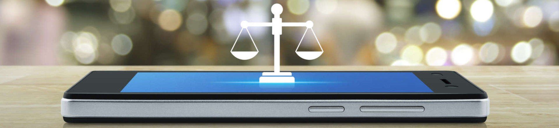 a symbol of justice scales on a smartphone